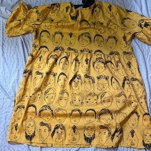 Plus size woman’s many faces dress
